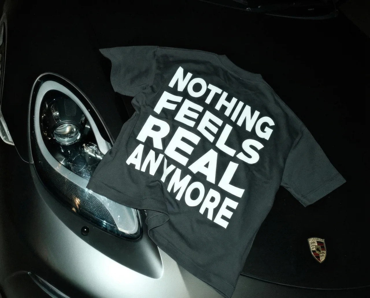 Nothing Feels Real Tee