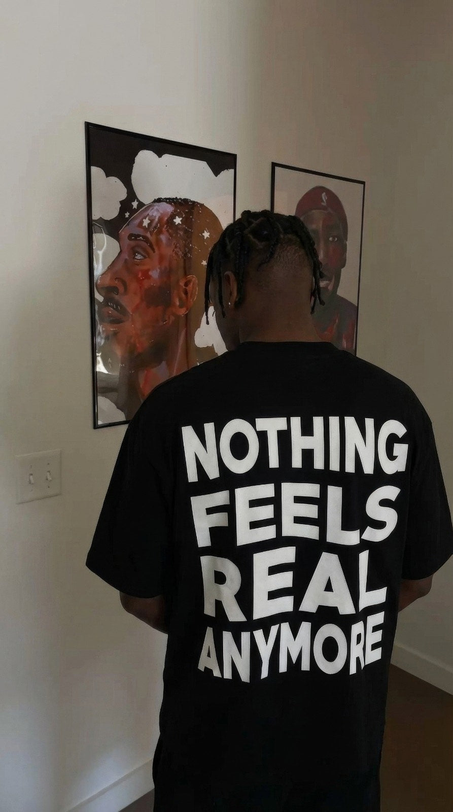 Nothing Feels Real Tee