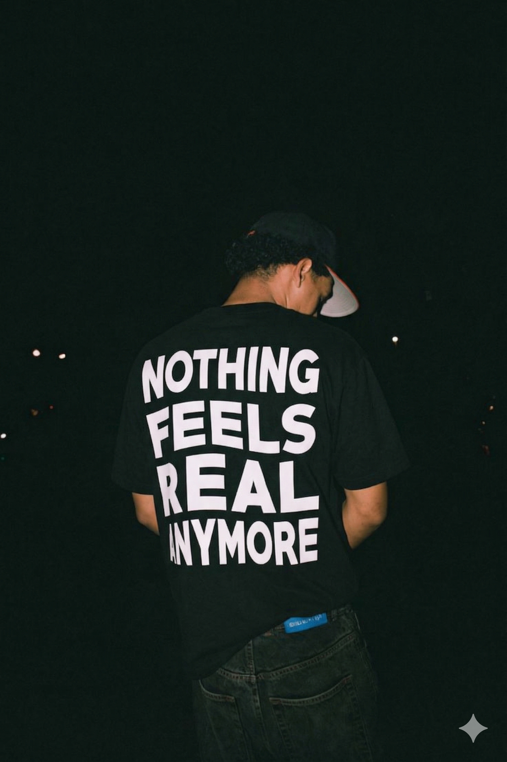 Nothing Feels Real Tee