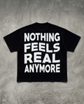 Nothing Feels Real Tee